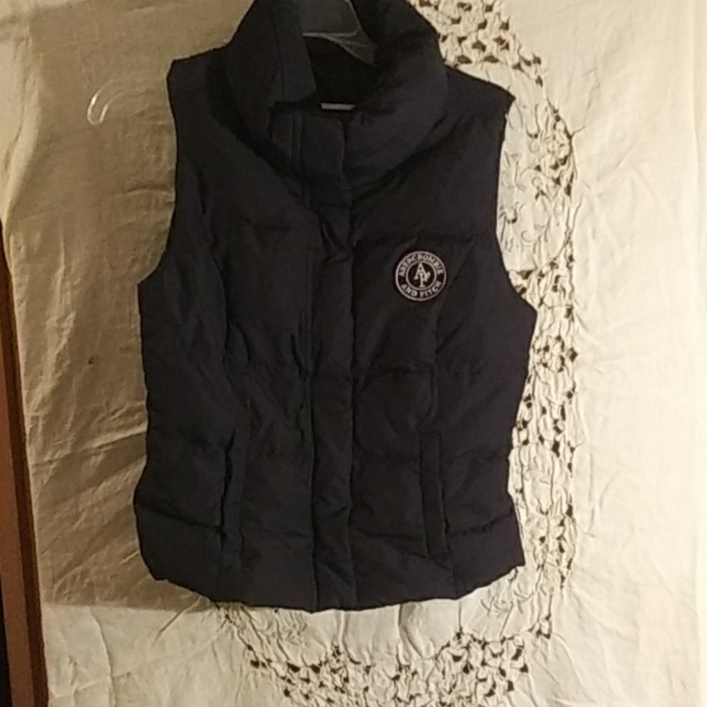 Dark blue puffer vest
